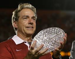 Saban with trophy